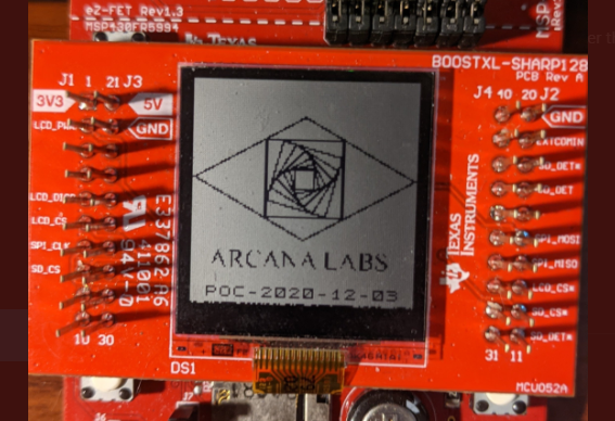 A photo of the Arcana Labs logo being displayed on PETI